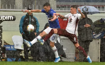  GENOA, ITALY - SEPTEMBER 22: Alex Ferrari of UC Sampdoria and Daniele Baselli of Torino FC during the Serie A match between UC Sampdoria and Torino FC at Stadio Luigi Ferraris on September 22, 2019 in Genoa, Italy. (Photo by Paolo Rattini/Getty Images)