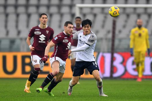 TURIN, ITALY - DECEMBER 20: Andrea Belotti of Torino battles for possession with Takehiro Tomiyasu of Bologna during the Serie A match between Torino FC and Bologna FC at Stadio Olimpico di Torino on December 20, 2020 in Turin, Italy. Sporting stadiums around Italy remain under strict restrictions due to the Coronavirus Pandemic as Government social distancing laws prohibit fans inside venues resulting in games being played behind closed doors. (Photo by Valerio Pennicino/Getty Images) TURIN, ITALY - DECEMBER 20: Andrea Belotti of Torino battles for possession with Takehiro Tomiyasu of Bologna during the Serie A match between Torino FC and Bologna FC at Stadio Olimpico di Torino on December 20, 2020 in Turin, Italy. Sporting stadiums around Italy remain under strict restrictions due to the Coronavirus Pandemic as Government social distancing laws prohibit fans inside venues resulting in games being played behind closed doors. (Photo by Valerio Pennicino/Getty Images)