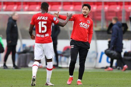 ALKMAAR, NETHERLANDS - MARCH 21: Bruno Martins Indi and Yukinari Sugawara of AZ Alkmaar celebrate after the Dutch Eredivisie match between AZ Alkmaar and PSV Eindhoven at AFAS-Stadium on March 21, 2021 in Alkmaar, Netherlands. (Photo by Dean Mouhtaropoulos/Getty Images) ALKMAAR, NETHERLANDS - MARCH 21: Bruno Martins Indi and Yukinari Sugawara of AZ Alkmaar celebrate after the Dutch Eredivisie match between AZ Alkmaar and PSV Eindhoven at AFAS-Stadium on March 21, 2021 in Alkmaar, Netherlands. (Photo by Dean Mouhtaropoulos/Getty Images)