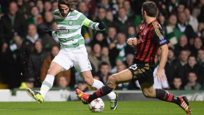 GLASGOW, SCOTLAND - NOVEMBER 26:  Giorgios Samaras of Celtic is tackled by Daniele Bonera of AC Milan during the UEFA Champions League Group H match between Celtic and AC Milan at Celtic Park Stadium on November 26, 2013 in Glasgow, Scotland.  (Photo by Jeff J Mitchell/Getty Images) 