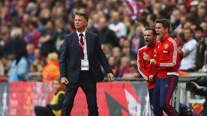 LONDON, ENGLAND - MAY 21:  Louis van Gaal manager of Manchester United celebrates with Juan Mata and Ander Herrera as Jesse Lingard of Manchester United scores their second goal during The Emirates FA Cup Final match between Manchester United and Crystal Palace at Wembley Stadium on May 21, 2016 in London, England.  (Photo by Paul Gilham/Getty Images) 