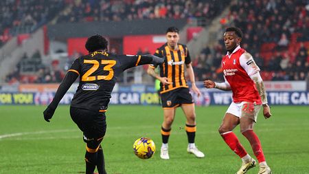 ROTHERHAM, ENGLAND - FEBRUARY 13: Jaden Philogene-Bidace of Hull City scores his team's first goal with a rabona during the Sky Bet Championship match between Rotherham United and Hull City at AESSEAL New York Stadium on February 13, 2024 in Rotherham, England. (Photo by Matt McNulty/Getty Images)