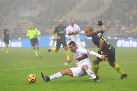 MILAN, ITALY - DECEMBER 11: Joao Mario (R) of FC Internazionale tackles Armando Izzo of Genoa CFC during the Serie A match between FC Internazionale and Genoa CFC at Stadio Giuseppe Meazza on December 11, 2016 in Milan, Italy. (Photo by Valerio Pennicino/Getty Images) MILAN, ITALY - DECEMBER 11: Joao Mario (R) of FC Internazionale tackles Armando Izzo of Genoa CFC during the Serie A match between FC Internazionale and Genoa CFC at Stadio Giuseppe Meazza on December 11, 2016 in Milan, Italy. (Photo by Valerio Pennicino/Getty Images)