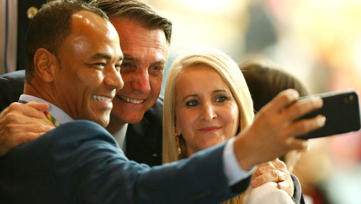 RIO DE JANEIRO, BRAZIL - JULY 07: President of Brazil Jair Bolsonaro poses for a selfie with Cafu during the Copa America Brazil 2019 Final match between Brazil and Peru at Maracana Stadium on July 07, 2019 in Rio de Janeiro, Brazil. (Photo by Wagner Meier/Getty Images) RIO DE JANEIRO, BRAZIL - JULY 07: President of Brazil Jair Bolsonaro poses for a selfie with Cafu during the Copa America Brazil 2019 Final match between Brazil and Peru at Maracana Stadium on July 07, 2019 in Rio de Janeiro, Brazil. (Photo by Wagner Meier/Getty Images)