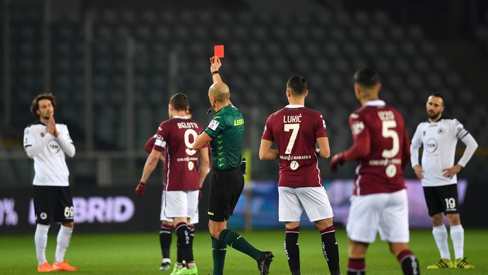 TURIN, ITALY - JANUARY 16: Referee, Michael Fabbri shows Luca Vignali of Spezia a red card during the Serie A match between Torino FC and Spezia Calcio at Stadio Olimpico di Torino on January 16, 2021 in Turin, Italy. Sporting stadiums around Italy remain under strict restrictions due to the Coronavirus Pandemic as Government social distancing laws prohibit fans inside venues resulting in games being played behind closed doors. (Photo by Valerio Pennicino/Getty Images) TURIN, ITALY - JANUARY 16: Referee, Michael Fabbri shows Luca Vignali of Spezia a red card during the Serie A match between Torino FC and Spezia Calcio at Stadio Olimpico di Torino on January 16, 2021 in Turin, Italy. Sporting stadiums around Italy remain under strict restrictions due to the Coronavirus Pandemic as Government social distancing laws prohibit fans inside venues resulting in games being played behind closed doors. (Photo by Valerio Pennicino/Getty Images)