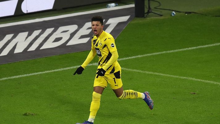 LEIPZIG, GERMANY - JANUARY 09: Jadon Sancho of Borussia Dortmund celebrates after scoring their team's first goal during the Bundesliga match between RB Leipzig and Borussia Dortmund at Red Bull Arena on January 09, 2021 in Leipzig, Germany. Sporting stadiums around Germany remain under strict restrictions due to the Coronavirus Pandemic as Government social distancing laws prohibit fans inside venues resulting in games being played behind closed doors. (Photo by Maja Hitij/Getty Images) LEIPZIG, GERMANY - JANUARY 09: Jadon Sancho of Borussia Dortmund celebrates after scoring their team's first goal during the Bundesliga match between RB Leipzig and Borussia Dortmund at Red Bull Arena on January 09, 2021 in Leipzig, Germany. Sporting stadiums around Germany remain under strict restrictions due to the Coronavirus Pandemic as Government social distancing laws prohibit fans inside venues resulting in games being played behind closed doors. (Photo by Maja Hitij/Getty Images)