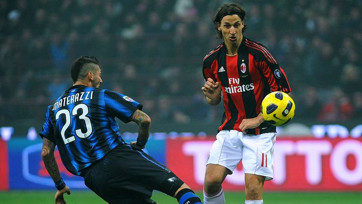 MILAN, ITALY - NOVEMBER 14:  Marco Materazzi of FC Internazionale Milano clashes with Zlatan Ibrahimovic of AC Milan during the Serie A match between FC Internazionale Milano and AC Milan at Stadio Giuseppe Meazza on November 14, 2010 in Milan, Italy.  (Photo by Valerio Pennicino/Getty Images) 