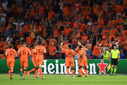 AMSTERDAM, NETHERLANDS - JUNE 13: Wout Weghorst of Netherlands celebrates with Jurrien Timber and Georginio Wijnaldum after scoring their side's second goal during the UEFA Euro 2020 Championship Group C match between Netherlands and Ukraine at the Johan Cruijff ArenA on June 13, 2021 in Amsterdam, Netherlands. (Photo by John Thys - Pool/Getty Images) 