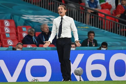 LONDON, ENGLAND - JULY 06: Roberto Mancini, Head Coach of Italy reacts during the UEFA Euro 2020 Championship Semi-final match between Italy and Spain at Wembley Stadium on July 06, 2021 in London, England. (Photo by Andy Rain - Pool/Getty Images) LONDON, ENGLAND - JULY 06: Roberto Mancini, Head Coach of Italy reacts during the UEFA Euro 2020 Championship Semi-final match between Italy and Spain at Wembley Stadium on July 06, 2021 in London, England. (Photo by Andy Rain - Pool/Getty Images)