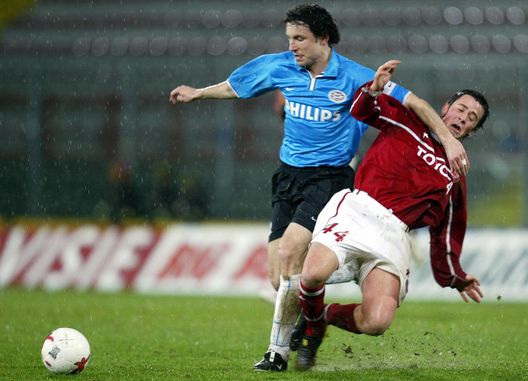 PERUGIA, ITALY: Perugia's Italian midfielder Fabio Gatti (R) ffights for the ball with PSV Eindhoven's Dutch midfielder Bommel during their third round first leg UEFA football match in Perugia 26 February 2004. AFP PHOTO/ Carlo BARONCINI (Photo credit should read CARLO BARONCINI/AFP/Getty Images) PERUGIA, ITALY: Perugia's Italian midfielder Fabio Gatti (R) ffights for the ball with PSV Eindhoven's Dutch midfielder Bommel during their third round first leg UEFA football match in Perugia 26 February 2004. AFP PHOTO/ Carlo BARONCINI (Photo credit should read CARLO BARONCINI/AFP/Getty Images)
