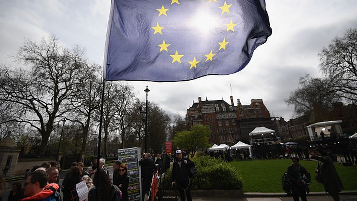 LONDON, ENGLAND - MARCH 29: A man holds an EU flag during a small pro EU demonstration near Parliament on March 29, 2017 in London, England. Today British Prime Minister Theresa May addresses the Houses of Parliament as Article 50 is triggered and the process that takes Britain out of the European Union begins. (Photo by Carl Court/Getty Images) LONDON, ENGLAND - MARCH 29: A man holds an EU flag during a small pro EU demonstration near Parliament on March 29, 2017 in London, England. Today British Prime Minister Theresa May addresses the Houses of Parliament as Article 50 is triggered and the process that takes Britain out of the European Union begins. (Photo by Carl Court/Getty Images)