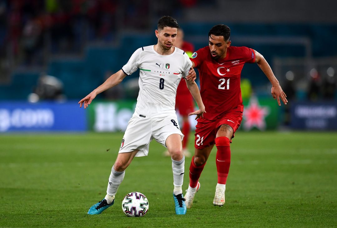  ROME, ITALY - JUNE 11: Jorginho of Italy is closed down by Irfan Can Kahveci of Turkey during the UEFA Euro 2020 Championship Group A match between Turkey and Italy at the Stadio Olimpico on June 11, 2021 in Rome, Italy. (Photo by Claudio Villa/Getty Images) 