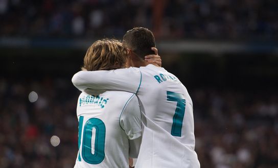 MADRID, SPAIN - NOVEMBER 25: Cristiano Ronaldo of Real Madrid CF celebrates with Luka Modric after scoring his team's 3rd goal from a penalty rebound during the La Liga match between Real Madrid and Malaga at Estadio Santiago Bernabeu on November 25, 2017 in Madrid, Spain. (Photo by Denis Doyle/Getty Images) MADRID, SPAIN - NOVEMBER 25: Cristiano Ronaldo of Real Madrid CF celebrates with Luka Modric after scoring his team's 3rd goal from a penalty rebound during the La Liga match between Real Madrid and Malaga at Estadio Santiago Bernabeu on November 25, 2017 in Madrid, Spain. (Photo by Denis Doyle/Getty Images)