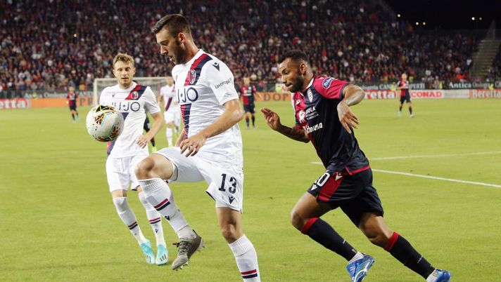CAGLIARI, ITALY - OCTOBER 30:  contrast with Joao Pedro of Cagliari and Mattia Bani of Bolognaduring the Serie A match between Cagliari Calcio and Bologna FC at Sardegna Arena on October 30, 2019 in Cagliari, Italy.  (Photo by Enrico Locci/Getty Images) 