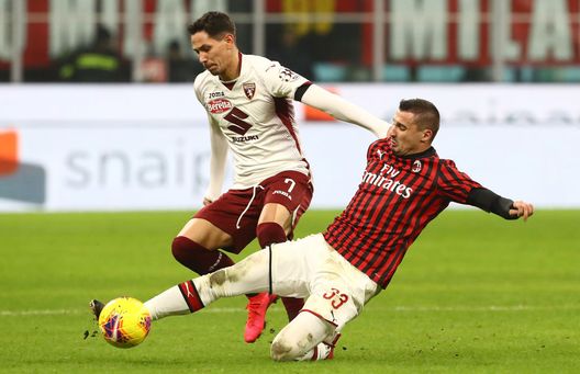 MILAN, ITALY - JANUARY 28: Sasa Lukic of Torino is challenged by Rade Krunic of AC Milan during the Coppa Italia Quarter Final match between AC Milan and Torino at San Siro on January 28, 2020 in Milan, Italy. (Photo by Marco Luzzani/Getty Images) MILAN, ITALY - JANUARY 28: Sasa Lukic of Torino is challenged by Rade Krunic of AC Milan during the Coppa Italia Quarter Final match between AC Milan and Torino at San Siro on January 28, 2020 in Milan, Italy. (Photo by Marco Luzzani/Getty Images)