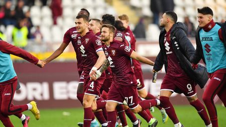 TURIN, ITALY - FEBRUARY 05: Karol Linetty and Alessandro Buongiorno of Torino FC celebrate with the fans after the team's victory during the Serie A match between Torino FC and Udinese Calcio at Stadio Olimpico di Torino on February 05, 2023 in Turin, Italy. (Photo by Valerio Pennicino/Getty Images)