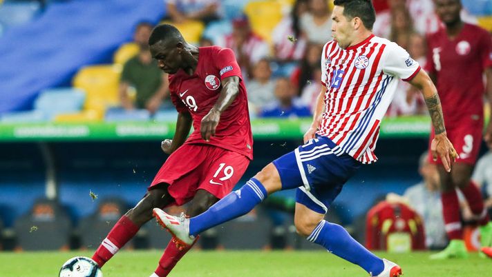 RIO DE JANEIRO, BRAZIL - JUNE 16: Almoez Ali #19 of Qatar kicks the ball to score the first goal of his team during the match against Paraguay for the Copa America 2019 at Maracana Stadium on June 16, 2019 in Rio de Janeiro, Brazil. (Photo by Alexandre Schneider/Getty Images) RIO DE JANEIRO, BRAZIL - JUNE 16: Almoez Ali #19 of Qatar kicks the ball to score the first goal of his team during the match against Paraguay for the Copa America 2019 at Maracana Stadium on June 16, 2019 in Rio de Janeiro, Brazil. (Photo by Alexandre Schneider/Getty Images)