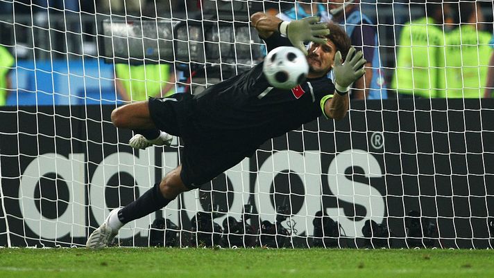 VIENNA, AUSTRIA - JUNE 20: Rustu Recber of Turkey makes the save in the penalty shoot out to win the UEFA EURO 2008 Quarter Final match between Croatia and Turkey at Ernst Happel Stadion on June 20, 2008 in Vienna, Austria. (Photo by Clive Rose/Getty Images) VIENNA, AUSTRIA - JUNE 20: Rustu Recber of Turkey makes the save in the penalty shoot out to win the UEFA EURO 2008 Quarter Final match between Croatia and Turkey at Ernst Happel Stadion on June 20, 2008 in Vienna, Austria. (Photo by Clive Rose/Getty Images)