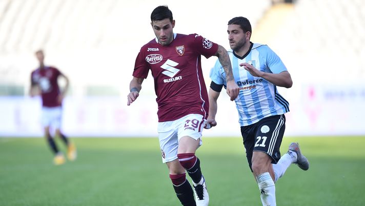 TURIN, ITALY - NOVEMBER 26:  Nicola Murru (L) of Torino FC in action agsainst Mauro Coppolaro of Virtus Entella during the Coppa Italia match between Torino FC and Virtus Entella at Stadio Olimpico di Torino on November 26, 2020 in Turin, Italy.  (Photo by Valerio Pennicino/Getty Images) 
