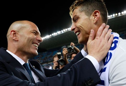 MALAGA, SPAIN - MAY 21: Zinedine Zidane, Manager of Real Madrid celebrates with Cristiano Ronaldo after being crowned champions following the La Liga match between Malaga and Real Madrid at La Rosaleda Stadium on May 21, 2017 in Malaga, Spain. (Photo by Gonzalo Arroyo Moreno/Getty Images) MALAGA, SPAIN - MAY 21: Zinedine Zidane, Manager of Real Madrid celebrates with Cristiano Ronaldo after being crowned champions following the La Liga match between Malaga and Real Madrid at La Rosaleda Stadium on May 21, 2017 in Malaga, Spain. (Photo by Gonzalo Arroyo Moreno/Getty Images)