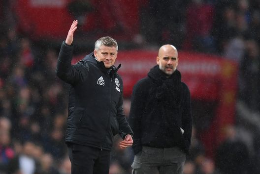 MANCHESTER, ENGLAND - MARCH 08: Manchester United manager Ole Gunnar Solskjaer and Manchester City manager Pep Guardiola look on during the Premier League match between Manchester United and Manchester City at Old Trafford on March 08, 2020 in Manchester, United Kingdom. (Photo by Michael Regan/Getty Images) Di padre in figlia: Karna Solskjaer, esordio nello United- immagine 2