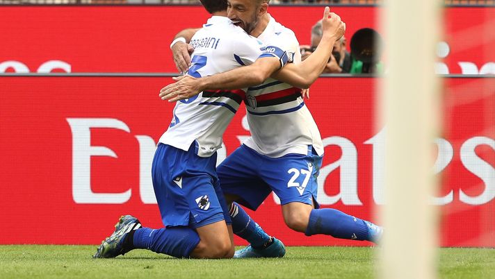 MILAN, ITALY - APRIL 03: Fabio Quagliarella (R) of UC Sampdoria celebrates with his team-mate Manolo Gabbiadini (L) after scoring the opening goal during the Serie A match between AC Milan and UC Sampdoria at Stadio Giuseppe Meazza on April 03, 2021 in Milan, Italy. Sporting stadiums around Italy remain under strict restrictions due to the Coronavirus Pandemic as Government social distancing laws prohibit fans inside venues resulting in games being played behind closed doors. (Photo by Marco Luzzani/Getty Images) MILAN, ITALY - APRIL 03: Fabio Quagliarella (R) of UC Sampdoria celebrates with his team-mate Manolo Gabbiadini (L) after scoring the opening goal during the Serie A match between AC Milan and UC Sampdoria at Stadio Giuseppe Meazza on April 03, 2021 in Milan, Italy. Sporting stadiums around Italy remain under strict restrictions due to the Coronavirus Pandemic as Government social distancing laws prohibit fans inside venues resulting in games being played behind closed doors. (Photo by Marco Luzzani/Getty Images)