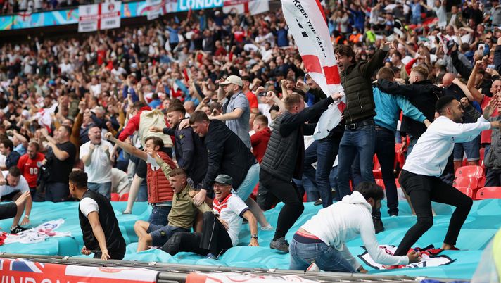 LONDON, ENGLAND - JUNE 29: England fans celebrate after their side's first goal scored by Raheem Sterling (Not pictured) during the UEFA Euro 2020 Championship Round of 16 match between England and Germany at Wembley Stadium on June 29, 2021 in London, England. (Photo by Carl Recine - Pool/Getty Images) LONDON, ENGLAND - JUNE 29: England fans celebrate after their side's first goal scored by Raheem Sterling (Not pictured) during the UEFA Euro 2020 Championship Round of 16 match between England and Germany at Wembley Stadium on June 29, 2021 in London, England. (Photo by Carl Recine - Pool/Getty Images)
