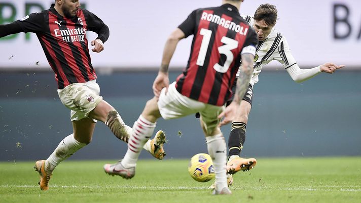 MILAN, ITALY - JANUARY 06: Federico Chiesa of Juventus scores his team's second goal during the Serie A match between AC Milan and Juventus at Stadio Giuseppe Meazza on January 06, 2021 in Milan, Italy. Sporting stadiums around Italy remain under strict restrictions due to the Coronavirus Pandemic as Government social distancing laws prohibit fans inside venues resulting in games being played behind closed doors. (Photo by Daniele Badolato - Juventus FC/Juventus FC via Getty Images) MILAN, ITALY - JANUARY 06: Federico Chiesa of Juventus scores his team's second goal during the Serie A match between AC Milan and Juventus at Stadio Giuseppe Meazza on January 06, 2021 in Milan, Italy. Sporting stadiums around Italy remain under strict restrictions due to the Coronavirus Pandemic as Government social distancing laws prohibit fans inside venues resulting in games being played behind closed doors. (Photo by Daniele Badolato - Juventus FC/Juventus FC via Getty Images)