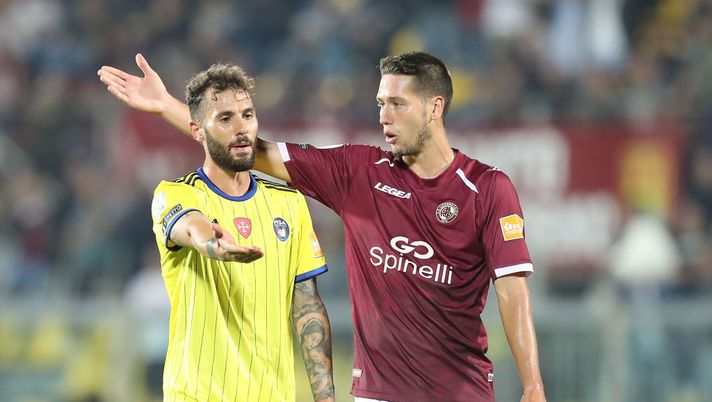 LIVORNO, ITALY - OCTOBER 26: Nicholas Siega of Pisa Sc and Lorenzo Gonnelli of AS Livorno Calcio gesture during the Serie B match between AS Livorno and Pisa SC at Stadio Armando Picchi on October 26, 2019 in Livorno, Italy. (Photo by Gabriele Maltinti/Getty Images) LIVORNO, ITALY - OCTOBER 26: Nicholas Siega of Pisa Sc and Lorenzo Gonnelli of AS Livorno Calcio gesture during the Serie B match between AS Livorno and Pisa SC at Stadio Armando Picchi on October 26, 2019 in Livorno, Italy. (Photo by Gabriele Maltinti/Getty Images)