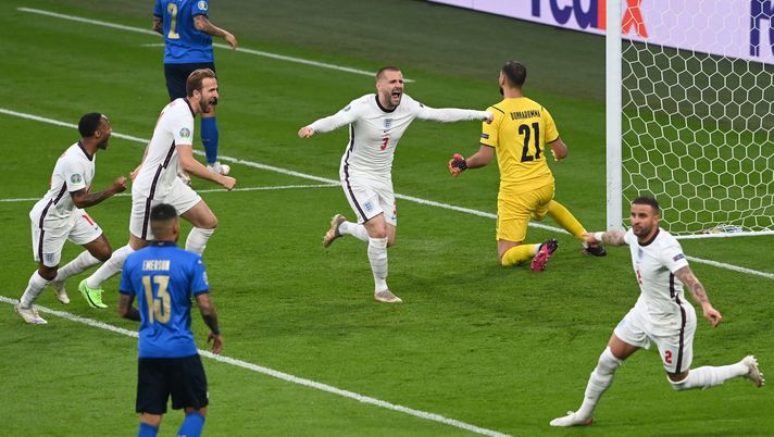 LONDON, ENGLAND - JULY 11: Luke Shaw of England celebrates after scoring their team's first goal during the UEFA Euro 2020 Championship Final between Italy and England at Wembley Stadium on July 11, 2021 in London, England. (Photo by Facundo Arrizabalaga - Pool/Getty Images) 