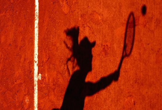 PARIS, FRANCE - JUNE 01: The shadow of Agnieszka Radwanska of Poland is pictured during her ladies singles second round match against Alsion Van Uytvanck of Belgium on day five of the 2017 French Open at Roland Garros on June 1, 2017 in Paris, France. (Photo by Clive Brunskill/Getty Images) PARIS, FRANCE - JUNE 01: The shadow of Agnieszka Radwanska of Poland is pictured during her ladies singles second round match against Alsion Van Uytvanck of Belgium on day five of the 2017 French Open at Roland Garros on June 1, 2017 in Paris, France. (Photo by Clive Brunskill/Getty Images)