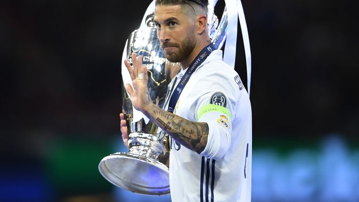 CARDIFF, WALES - JUNE 03: Sergio Ramos of Real Madrid celebrates with The Champions League trophy after the UEFA Champions League Final between Juventus and Real Madrid at National Stadium of Wales on June 3, 2017 in Cardiff, Wales. (Photo by Laurence Griffiths/Getty Images) CARDIFF, WALES - JUNE 03: Sergio Ramos of Real Madrid celebrates with The Champions League trophy after the UEFA Champions League Final between Juventus and Real Madrid at National Stadium of Wales on June 3, 2017 in Cardiff, Wales. (Photo by Laurence Griffiths/Getty Images)