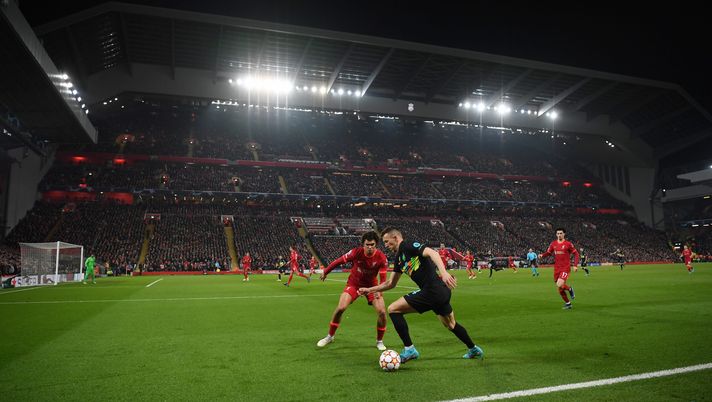 LIVERPOOL, ENGLAND - MARCH 08: Ivan Perisic of Inter Milan in action with Trent Alexander-Arnold of Liverpool during the UEFA Champions League Round Of Sixteen Leg Two match between Liverpool FC and FC Internazionale at Anfield on March 08, 2022 in Liverpool, England. (Photo by Michael Regan/Getty Images) LIVERPOOL, ENGLAND - MARCH 08: Ivan Perisic of Inter Milan in action with Trent Alexander-Arnold of Liverpool during the UEFA Champions League Round Of Sixteen Leg Two match between Liverpool FC and FC Internazionale at Anfield on March 08, 2022 in Liverpool, England. (Photo by Michael Regan/Getty Images)