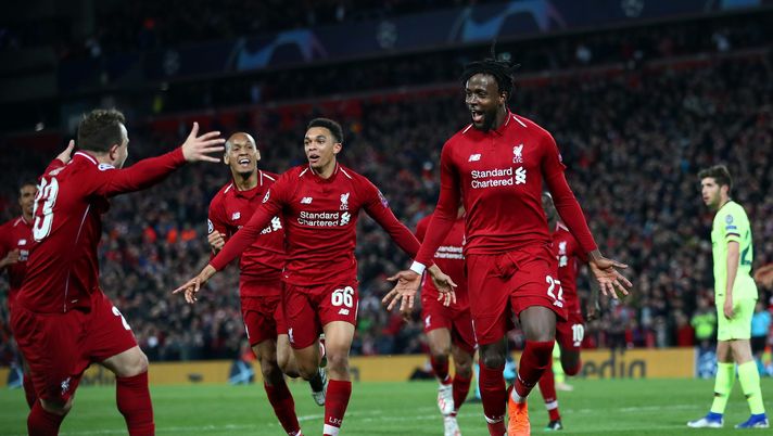 LIVERPOOL, ENGLAND - MAY 07: Divock Origi of Liverpool (27) celebrates as he scores his team's fourth goal with Xherdan Shaqiri and team mates during the UEFA Champions League Semi Final second leg match between Liverpool and Barcelona at Anfield on May 07, 2019 in Liverpool, England. (Photo by Clive Brunskill/Getty Images) Dall’Inghilterra: Fiorentina su un attaccante del Liverpool. Idea per l’estate - immagine 1