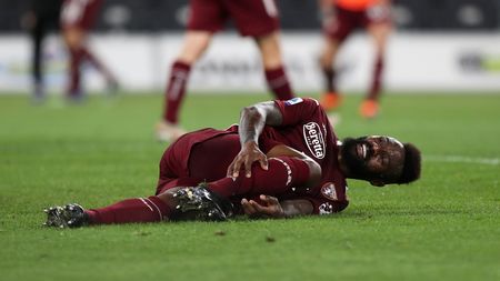 ROME, ITALY - MAY 18: Nicolas Nkoulou of Torino FC reacts as they hold their leg during the Serie A match between SS Lazio and Torino FC at Stadio Olimpico on May 18, 2021 in Rome, Italy. Sporting stadiums around Italy remain under strict restrictions due to the Coronavirus Pandemic as Government social distancing laws prohibit fans inside venues resulting in games being played behind closed doors. (Photo by Paolo Bruno/Getty Images) ROME, ITALY - MAY 18: Nicolas Nkoulou of Torino FC reacts as they hold their leg during the Serie A match between SS Lazio and Torino FC at Stadio Olimpico on May 18, 2021 in Rome, Italy. Sporting stadiums around Italy remain under strict restrictions due to the Coronavirus Pandemic as Government social distancing laws prohibit fans inside venues resulting in games being played behind closed doors. (Photo by Paolo Bruno/Getty Images)