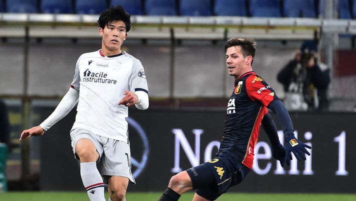 GENOA, ITALY JANUARY 09: Takehiro Tomiyasu of Bologna FC and Miha Zajc compete for the ball during the Serie A match between Genoa CFC and Bologna FC at Stadio Luigi Ferraris on January 9, 2021 in Genoa, Italy. (Photo by Paolo Rattini/Getty Images) 