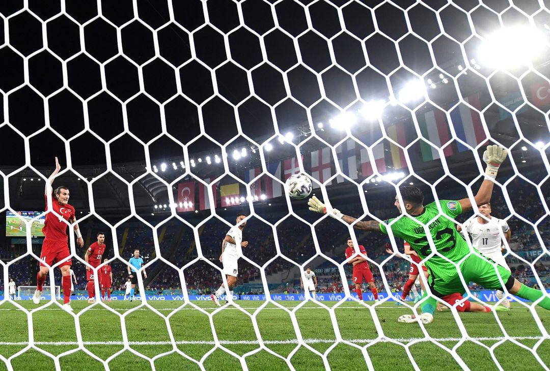  ROME, ITALY - JUNE 11: Ciro Immobile of Italy scores their side's second goal past Ugurcan Cakir of Turkey during the UEFA Euro 2020 Championship Group A match between Turkey and Italy at the Stadio Olimpico on June 11, 2021 in Rome, Italy. (Photo by Mike Hewitt/Getty Images) 