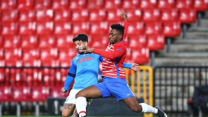 GRANADA, SPAIN - FEBRUARY 18: Lorenzo Insigne of SSC Napoli battles for possession with Yan Brice Eteki of Granada CF during the UEFA Europa League Round of 32 match between Granada CF and SSC Napoli at Nuevo Estadio Los Carmenes on February 18, 2021 in Granada, Spain. Sporting stadiums around Spain remain under strict restrictions due to the Coronavirus Pandemic as Government social distancing laws prohibit fans inside venues resulting in games being played behind closed doors. (Photo by Fran Santiago/Getty Images) GRANADA, SPAIN - FEBRUARY 18: Lorenzo Insigne of SSC Napoli battles for possession with Yan Brice Eteki of Granada CF during the UEFA Europa League Round of 32 match between Granada CF and SSC Napoli at Nuevo Estadio Los Carmenes on February 18, 2021 in Granada, Spain. Sporting stadiums around Spain remain under strict restrictions due to the Coronavirus Pandemic as Government social distancing laws prohibit fans inside venues resulting in games being played behind closed doors. (Photo by Fran Santiago/Getty Images)