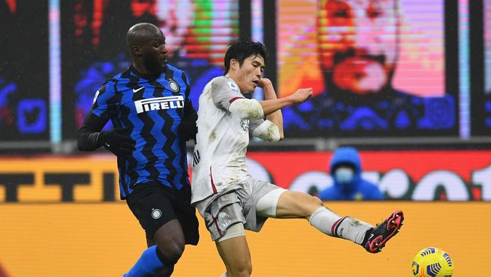 MILAN, ITALY - DECEMBER 05: Romelu Lukaku of FC Internazionale competes for the ball with Takehiro Tomiyasu of Bologna FC during the Serie A match between FC Internazionale and Bologna FC at Stadio Giuseppe Meazza on December 5, 2020 in Milan, Italy. (Photo by Claudio Villa - Inter/Inter via Getty Images) MILAN, ITALY - DECEMBER 05: Romelu Lukaku of FC Internazionale competes for the ball with Takehiro Tomiyasu of Bologna FC during the Serie A match between FC Internazionale and Bologna FC at Stadio Giuseppe Meazza on December 5, 2020 in Milan, Italy. (Photo by Claudio Villa - Inter/Inter via Getty Images)