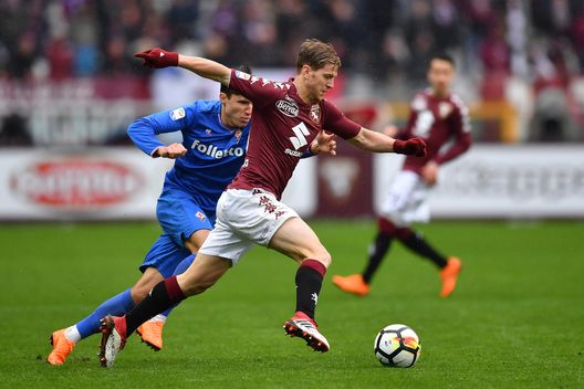  TURIN, ITALY - MARCH 18: Cristian Ansaldi (R) of Torino FC in action against Federico Chiesa of ACF Fiorentina during the serie A match between Torino FC and ACF Fiorentina at Stadio Olimpico di Torino on March 18, 2018 in Turin, Italy. (Photo by Valerio Pennicino/Getty Images) 