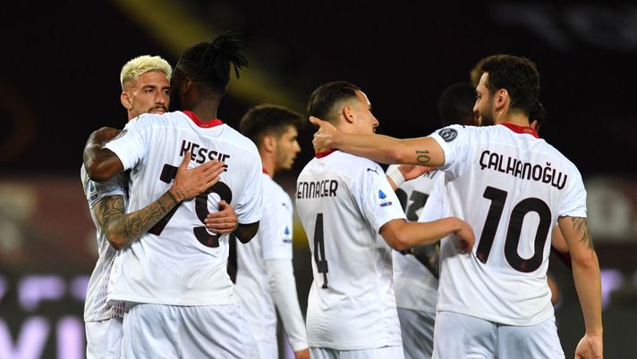 TURIN, ITALY - MAY 12: Franck Kessie of A.C. Milan celebrates with team mates after scoring their side's second goal during the Serie A match between Torino FC and AC Milan at Stadio Olimpico di Torino on May 12, 2021 in Turin, Italy. Sporting stadiums around Italy remain under strict restrictions due to the Coronavirus Pandemic as Government social distancing laws prohibit fans inside venues resulting in games being played behind closed doors. (Photo by Valerio Pennicino/Getty Images) TURIN, ITALY - MAY 12: Franck Kessie of A.C. Milan celebrates with team mates after scoring their side's second goal during the Serie A match between Torino FC and AC Milan at Stadio Olimpico di Torino on May 12, 2021 in Turin, Italy. Sporting stadiums around Italy remain under strict restrictions due to the Coronavirus Pandemic as Government social distancing laws prohibit fans inside venues resulting in games being played behind closed doors. (Photo by Valerio Pennicino/Getty Images)