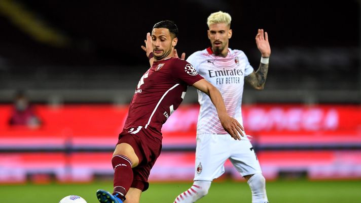 TURIN, ITALY - MAY 12: Rolando Mandragora of Torino FC stretches for the ball during the Serie A match between Torino FC and AC Milan at Stadio Olimpico di Torino on May 12, 2021 in Turin, Italy. Sporting stadiums around Italy remain under strict restrictions due to the Coronavirus Pandemic as Government social distancing laws prohibit fans inside venues resulting in games being played behind closed doors. (Photo by Valerio Pennicino/Getty Images) TURIN, ITALY - MAY 12: Rolando Mandragora of Torino FC stretches for the ball during the Serie A match between Torino FC and AC Milan at Stadio Olimpico di Torino on May 12, 2021 in Turin, Italy. Sporting stadiums around Italy remain under strict restrictions due to the Coronavirus Pandemic as Government social distancing laws prohibit fans inside venues resulting in games being played behind closed doors. (Photo by Valerio Pennicino/Getty Images)