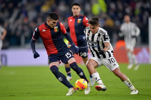 TURIN, ITALY - DECEMBER 05: Paulo Dybala of Juventus battles for the ball with Johan Vasquez of Genoa CFC during the Serie A match between Juventus and Genoa CFC at Allianz Stadium on December 05, 2021 in Turin, Italy. (Photo by Daniele Badolato - Juventus FC/Juventus FC via Getty Images)