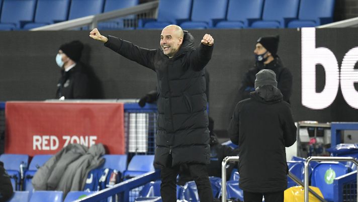 LIVERPOOL, ENGLAND - MARCH 20: Pep Guardiola, Manager of Manchester City celebrates after The Emirates FA Cup Quarter Final match between Everton v Manchester City at Goodison Park on March 20, 2021 in Liverpool, England. Sporting stadiums around the UK remain under strict restrictions due to the Coronavirus Pandemic as Government social distancing laws prohibit fans inside venues resulting in games being played behind closed doors.  (Photo by Peter Powell - Pool/Getty Images) 