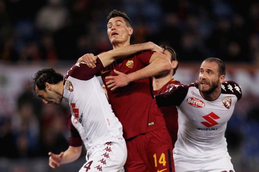 ROME, ITALY - MARCH 09: Patrick Schick of AS Roma competes for the ball with Emiliano Moretti and Alessandro De Silvestri of Torino FC during the Serie A match between AS Roma and Torino FC at Stadio Olimpico on March 9, 2018 in Rome, Italy. (Photo by Paolo Bruno/Getty Images) ROME, ITALY - MARCH 09: Patrick Schick of AS Roma competes for the ball with Emiliano Moretti and Alessandro De Silvestri of Torino FC during the Serie A match between AS Roma and Torino FC at Stadio Olimpico on March 9, 2018 in Rome, Italy. (Photo by Paolo Bruno/Getty Images)
