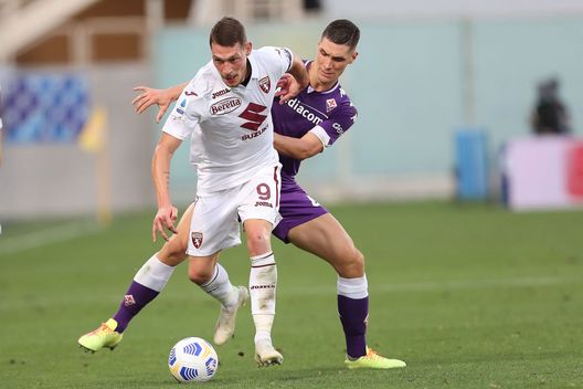 FLORENCE, ITALY - SEPTEMBER 19: Nikola Milenkovic of ACF Fiorentina battles for the ball with Andrea Belotti of Torino FC during the Serie A match between ACF Fiorentina and Torino FC at Stadio Artemio Franchi on September 19, 2020 in Florence, Italy.  (Photo by Gabriele Maltinti/Getty Images) 