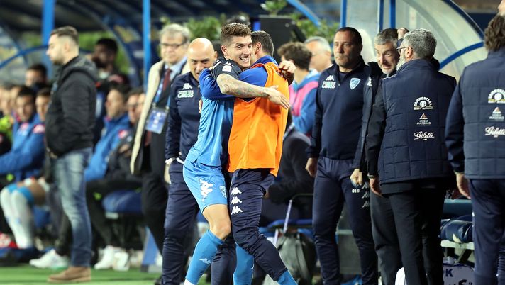 EMPOLI, ITALY - APRIL 03: Giovanni Di Lorenzo and Manuel Pasqual of Empoli FC celebrates after scoring a goal during the Serie A match between Empoli and SSC Napoli at Stadio Carlo Castellani on April 3, 2019 in Empoli, Italy.  (Photo by Gabriele Maltinti/Getty Images) 