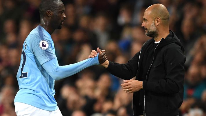MANCHESTER, ENGLAND - MAY 09: Yaya Toure of Manchester City shakes hands wtih Josep Guardiola, Manager of Manchester City after he is subbed off during the Premier League match between Manchester City and Brighton and Hove Albion at Etihad Stadium on May 9, 2018 in Manchester, England. (Photo by Gareth Copley/Getty Images) MANCHESTER, ENGLAND - MAY 09: Yaya Toure of Manchester City shakes hands wtih Josep Guardiola, Manager of Manchester City after he is subbed off during the Premier League match between Manchester City and Brighton and Hove Albion at Etihad Stadium on May 9, 2018 in Manchester, England. (Photo by Gareth Copley/Getty Images)