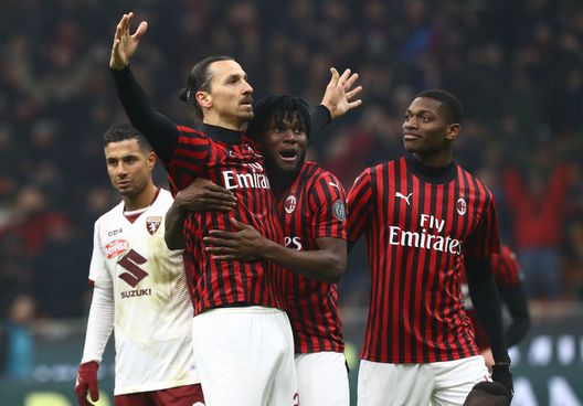  MILAN, ITALY - JANUARY 28: Zlatan Ibrahimovic (L) of AC Milan celebrates his goal with his team-mates Franck Kessie (C) and Rafael Leao (R) during the Coppa Italia Quarter Final match between AC Milan and Torino at San Siro on January 28, 2020 in Milan, Italy. (Photo by Marco Luzzani/Getty Images) 