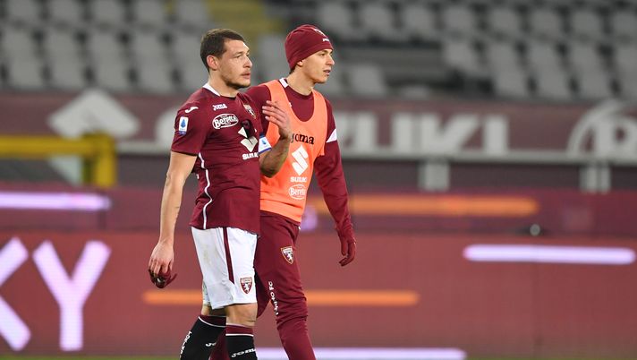 TURIN, ITALY - JANUARY 16: Andrea Belotti and Daniele Baselli of Torino interact after the Serie A match between Torino FC and Spezia Calcio at Stadio Olimpico di Torino on January 16, 2021 in Turin, Italy. Sporting stadiums around Italy remain under strict restrictions due to the Coronavirus Pandemic as Government social distancing laws prohibit fans inside venues resulting in games being played behind closed doors. (Photo by Valerio Pennicino/Getty Images) 
